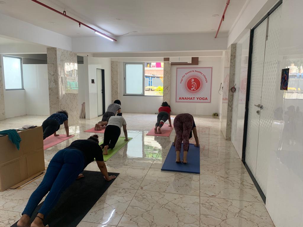 Yoga instructor guiding students in Pune